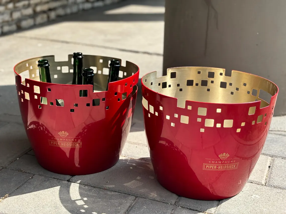 A pair of 2 massive PIPER champagne ice buckets – capable of chilling 12 standard bottles or 6 magnum bottles at once Piper-Heidsieck Reims