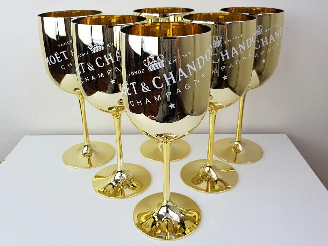 Set of 6 MOËT & CHANDON elegant glass goblets with gold metal coating, ideal for champagne enthusiasts and collectors A true statement piece